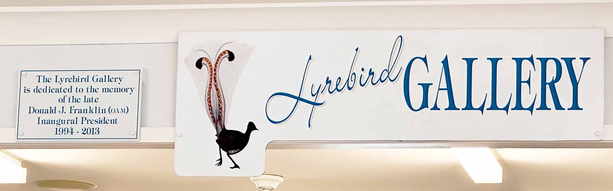 The Lyrebird Gallery internal signage showing dedication to the late Donald J Franklin